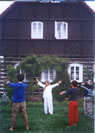 Creativity and fantasy are unlocked and developed through movement exercises. In the picture you can see morning exercise in front of the cottage in Nová Ves.